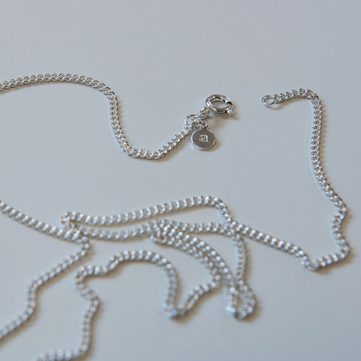 Sterling silver necklaces for mens by minimalist jewellery designer Alice Made This. 